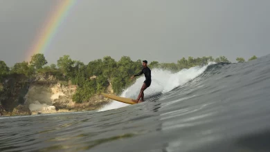 Longboarding coach glassy surf rainbow